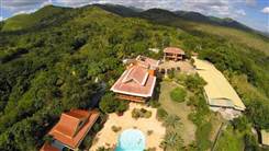 Vendo villa con 302 tareas de tierra en Pedro Brand , Santo Domingo , 10 habs. , 8 baños , 10 parqueos , US$ 1.50